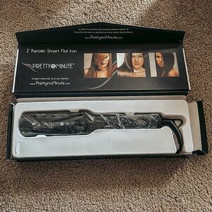 Pretty in a minute never used 2” keratin flat iron